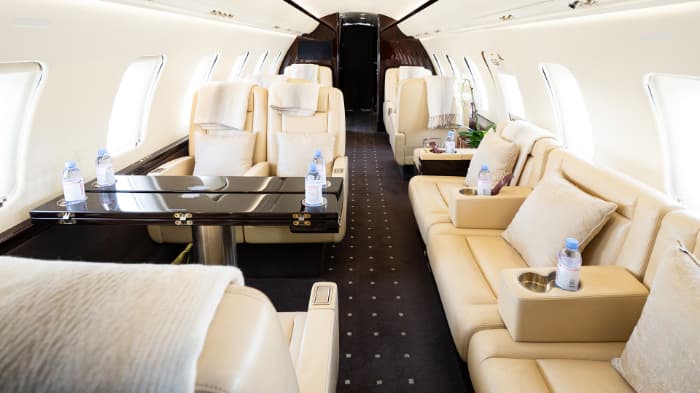 Cabin interior with cream leather seating